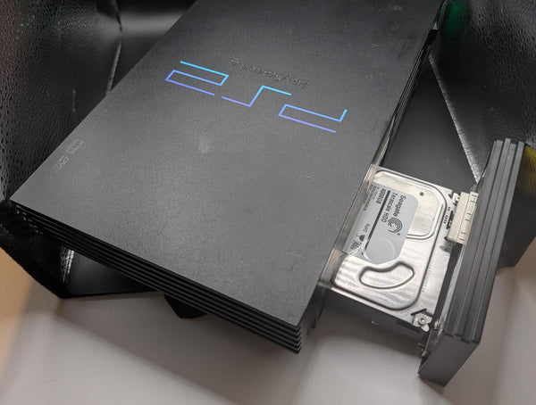PS2 4TB All-In-One Hard Drive Kit with 64MB Freemcboot card and Adapter.